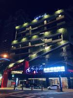 a building with a car on top of it at night at Icloud Luxury Resort &amp; Hotel in Taichung