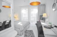 Łóżko lub łóżka w pokoju w obiekcie Hotel Ottaviano