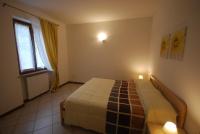 Posteľ alebo postele v izbe v ubytovaní Appartamento Angelica 3 - Theater Home