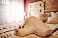 Postel nebo postele na pokoji v ubytování Casa Rural Molí de Fòrnols