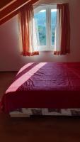 Posteľ alebo postele v izbe v ubytovaní Apartments Krajančić