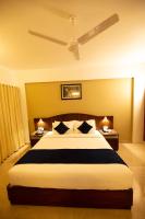 Hotel Guruvayur Darshanにあるベッド