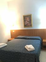 Posteľ alebo postele v izbe v ubytovaní Residence Lodi