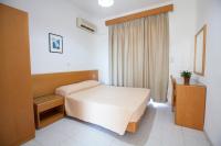 Postel nebo postele na pokoji v ubytování Moscha Hotel