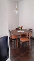 Televízia a/alebo spoločenská miestnosť v ubytovaní Apartments Krajančić