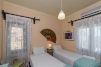 A bed or beds in a room at Best View Mountain Villa