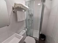 a bathroom with a shower and a toilet and a sink at Bondy chambre in Bondy