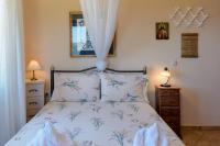 A bed or beds in a room at Best View Mountain Villa