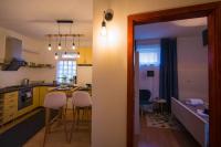 Kuchyňa alebo kuchynka v ubytovaní Teubel apartman 2