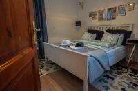 Posteľ alebo postele v izbe v ubytovaní Teubel apartman 2