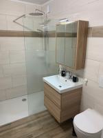 A bathroom at Ferienwohnungen zum Briefmarkenhaus