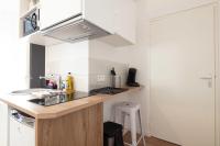 A kitchen or kitchenette at Studio Vahiny2 All comfort WIFI NETFLIX Parking