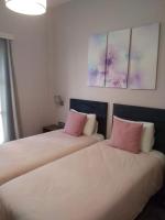 Posteľ alebo postele v izbe v ubytovaní Marina's Luxury Rooms