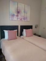 Posteľ alebo postele v izbe v ubytovaní Marina's Luxury Rooms