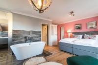 Postel nebo postele na pokoji v ubytování Hotel Norderriff