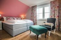 Postel nebo postele na pokoji v ubytování Hotel Norderriff