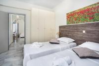 Postel nebo postele na pokoji v ubytování Heart of Paros Apartments
