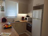 Kuchyň nebo kuchyňský kout v ubytování Popis Sea View Apartments