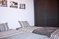 Posteľ alebo postele v izbe v ubytovaní Urban Manesa city center apartment with private patio