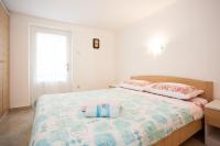 Posteľ alebo postele v izbe v ubytovaní Apartments Melita