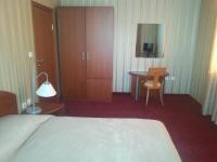 Postel nebo postele na pokoji v ubytování Hotel Perperikon