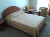 Postel nebo postele na pokoji v ubytování Hotel Perperikon