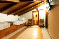 A bed or beds in a room at Papadeas Villas