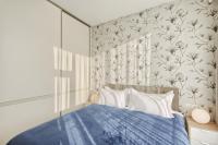 Asian Magnolia Boutique Apartmentsにあるベッド