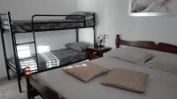 A bed or beds in a room at B&B Lo Scrigno del Salento
