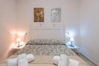 Cama o camas de una habitación en Apartamentos Centro Emérita