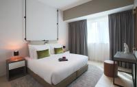 Postel nebo postele na pokoji v ubytování Dusit Princess Residences Dubai Marina