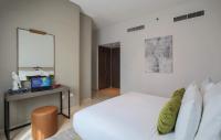 Postel nebo postele na pokoji v ubytování Dusit Princess Residences Dubai Marina