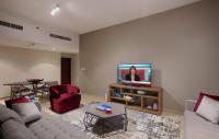 TV a/nebo společenská místnost v ubytování Dusit Princess Residences Dubai Marina