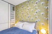 Asian Magnolia Boutique Apartmentsにあるベッド