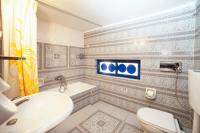 Kúpeľňa v ubytovaní Olympic Suites