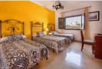 Posteľ alebo postele v izbe v ubytovaní HOTEL-FINCA Rural José Manuel 28pax