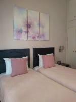 Posteľ alebo postele v izbe v ubytovaní Marina's Luxury Rooms