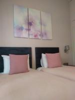 Posteľ alebo postele v izbe v ubytovaní Marina's Luxury Rooms