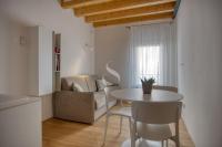 A seating area at Ca' dei Battuti Apartments