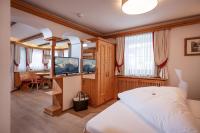 Televízia a/alebo spoločenská miestnosť v ubytovaní Wellnessresort Seiwald **** Superior