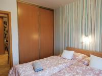 Posteľ alebo postele v izbe v ubytovaní Boroka Apartman