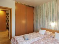Posteľ alebo postele v izbe v ubytovaní Boroka Apartman