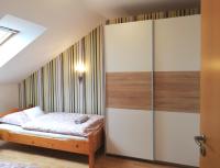 Posteľ alebo postele v izbe v ubytovaní Boroka Apartman