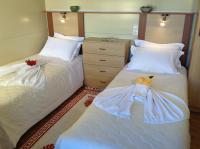 Postel nebo postele na pokoji v ubytování Chrissa Camping Rooms & Bungalows