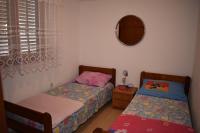Posteľ alebo postele v izbe v ubytovaní Apartments Šime Soline