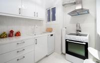 A kitchen or kitchenette at Unique apartment in Glyfada center
