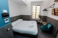 Posteľ alebo postele v izbe v ubytovaní Ottaviano Smart Rooms