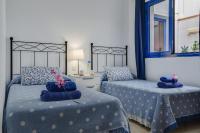 Postel nebo postele na pokoji v ubytování El Rincón de Famara