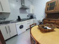 Kuchyň nebo kuchyňský kout v ubytování Apartamento Balcones del Tajo