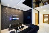 TV a/nebo společenská místnost v ubytování Prestige Apartamenty VINCI Centrum